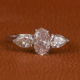 Pink Oval Cut Lab Grown Diamond Three Stone Engagement Ring