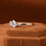 Elegant Pear Shaped Engagement Ring Featuring Princess Cut Diamond