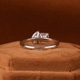 Elegant Pear Shaped Engagement Ring Featuring Princess Cut Diamond