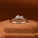 Elegant Pear Shaped Engagement Ring Featuring Princess Cut Diamond