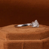 Elegant Pear Shaped Engagement Ring Featuring Princess Cut Diamond
