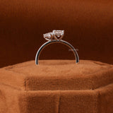 Elegant Pear Shaped Engagement Ring Featuring Princess Cut Diamond