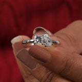 Elegant Pear Shaped Engagement Ring Featuring Princess Cut Diamond