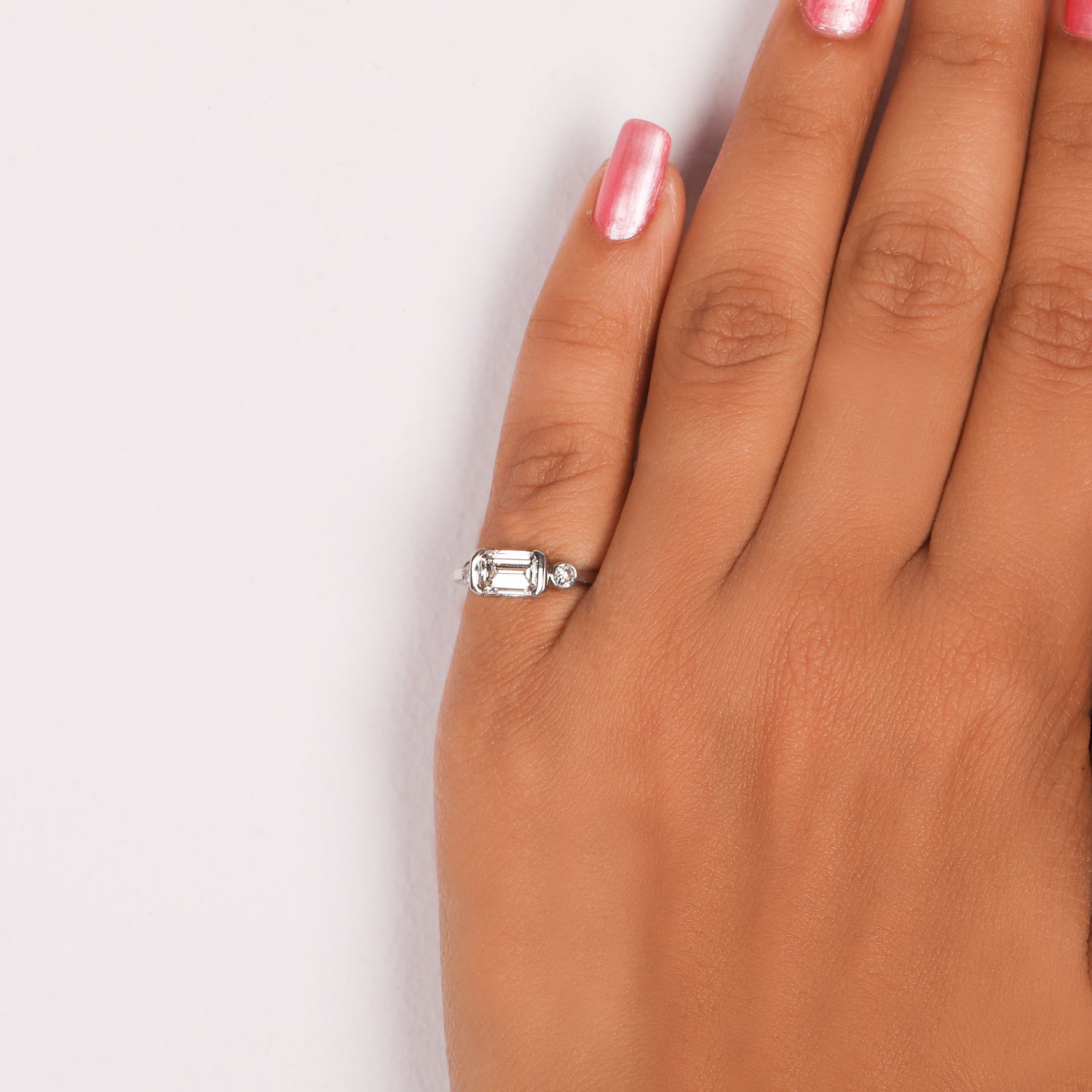 East West Emerald Cut Lab Grown Diamond Three Stone Engagement Ring