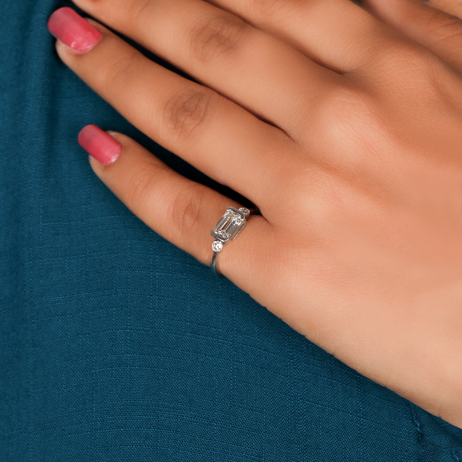 East West Emerald Cut Lab Grown Diamond Three Stone Engagement Ring