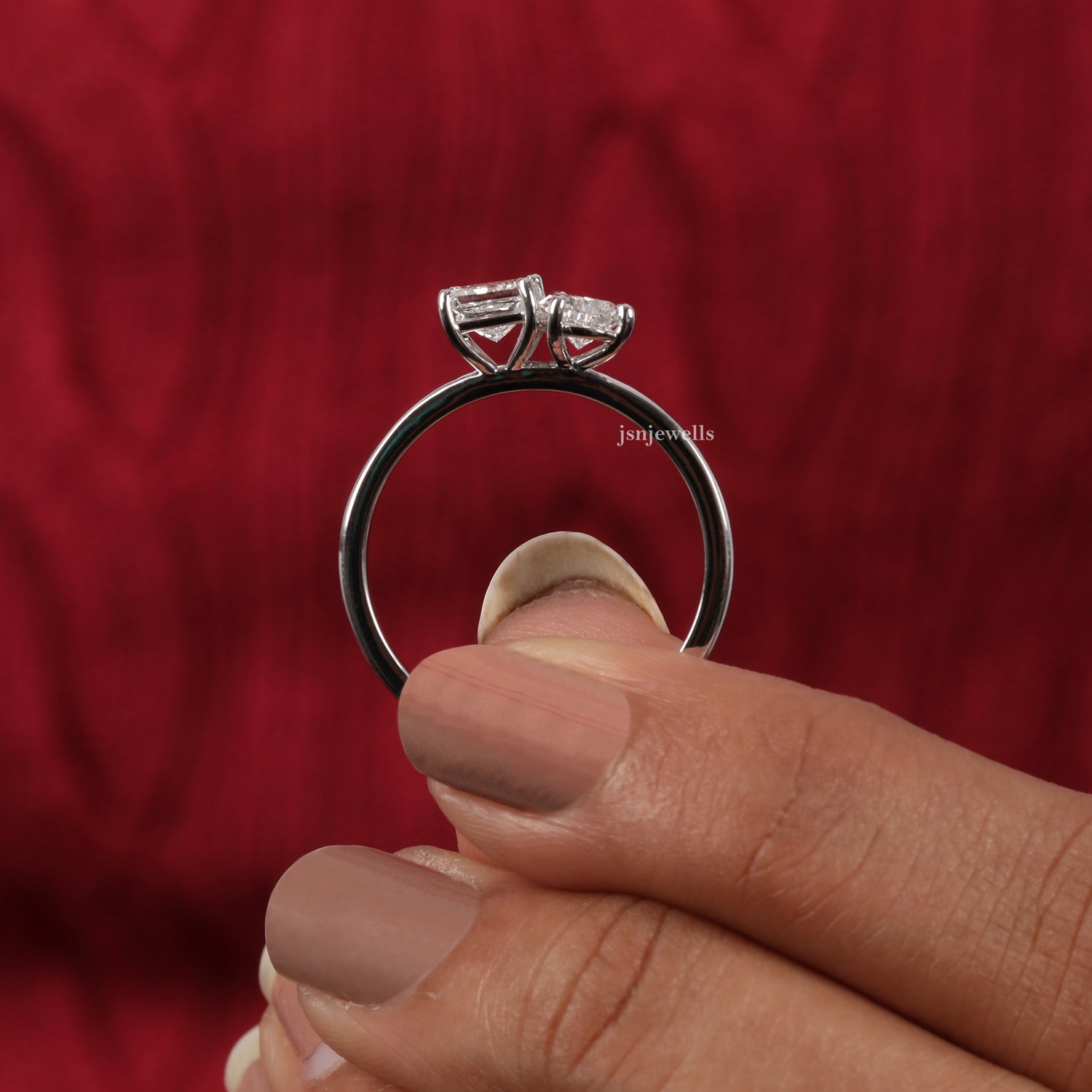 Elegant Pear Shaped Engagement Ring Featuring Princess Cut Diamond