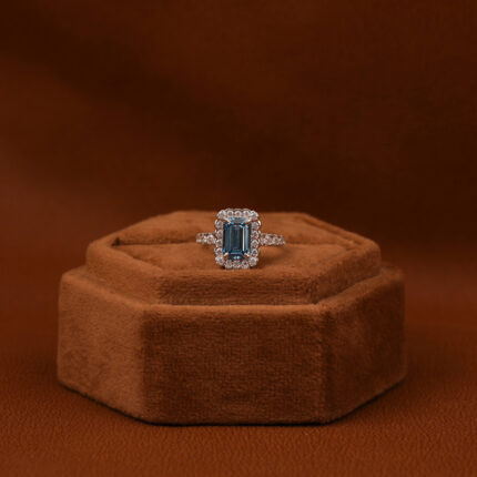 emerald cut blue diamond ring